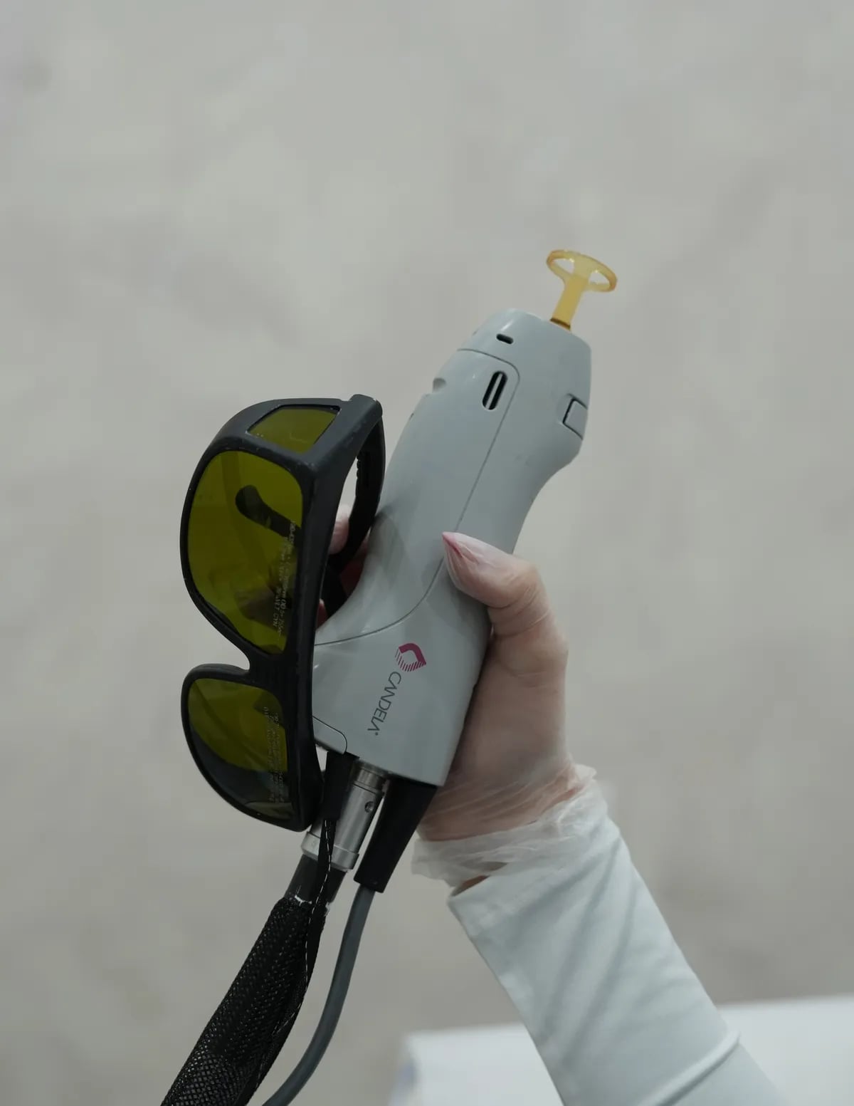 Candela GentleMax Pro handpiece during a treatment